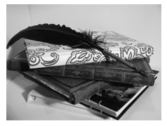 books with a feather on top